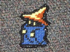 Black Mage, from Final Fantasy, made out of plastic canvas.